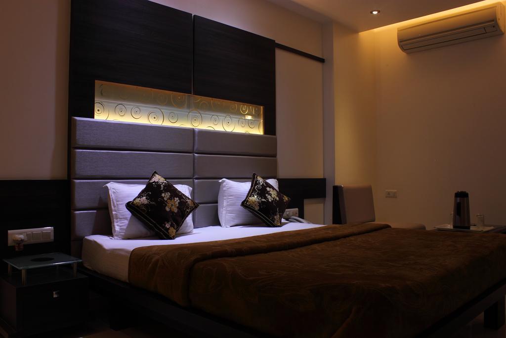 Hotel Apex Surate Chambre photo