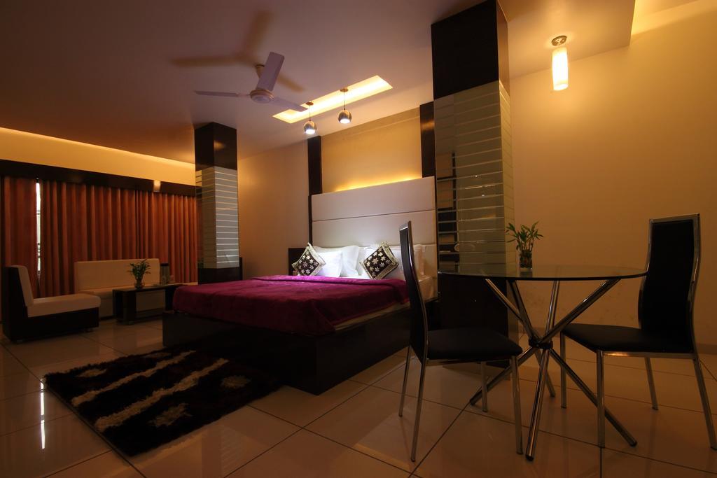 Hotel Apex Surate Chambre photo