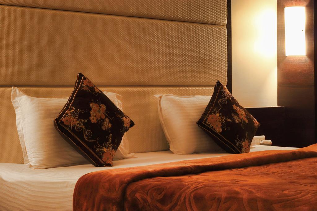 Hotel Apex Surate Chambre photo