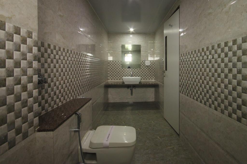 Hotel Apex Surate Chambre photo