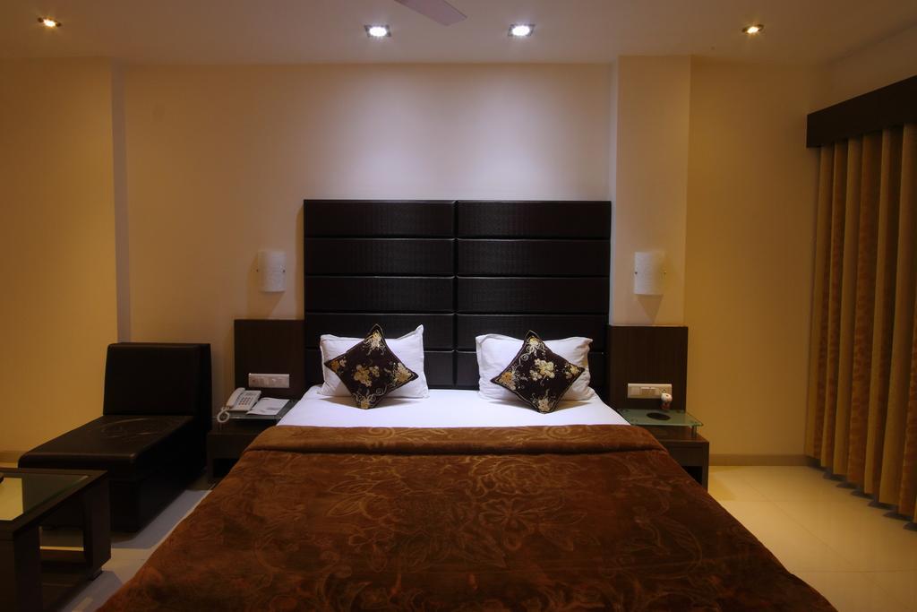 Hotel Apex Surate Chambre photo